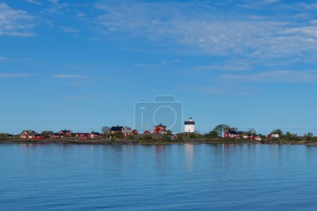 Photo for Lighthouse Svartklubben outside of Grisslehamn in Roslagen, Sweden. Built 1820. - Royalty Free Image