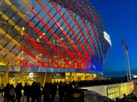 Photo for JOHANNESHOV, SWEDEN - MARS 16, 2023: Tele2 arena illuminated in red, yellow and blue, the colors of Djurgardens IF. - Royalty Free Image