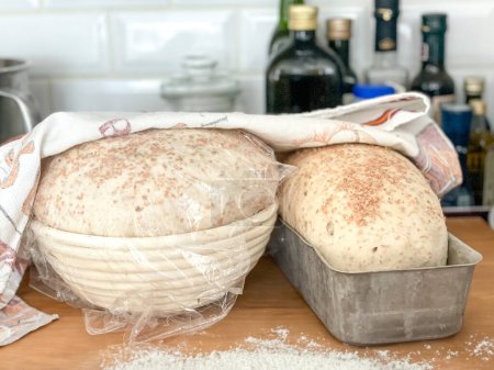 Photo for Homebaked bread waiting for the dough to rise. - Royalty Free Image