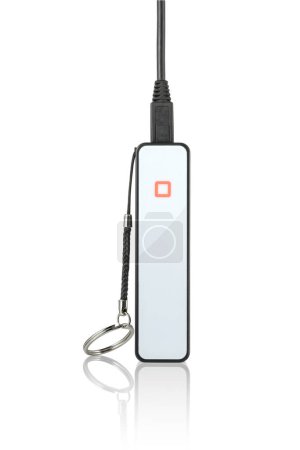 Edgy power bank with cable standing on white background 