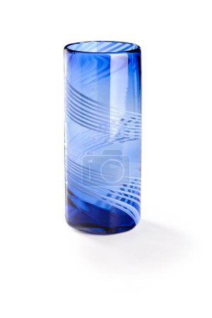 Blue glass vase with decorative lines around, isolated