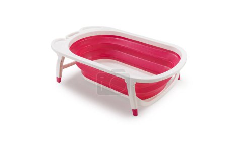 Photo for Red retractable bathtub for babies opened isolated - Royalty Free Image