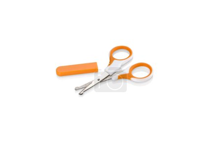 Orange and white nail scissors without safety cap isolated