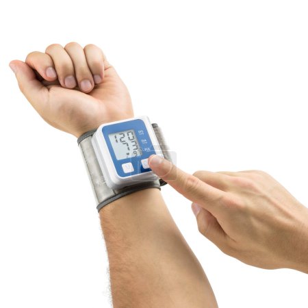 Caucasian male using a wrist digital heart rate monitor, isolated
