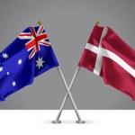 3D illustration of Two Wavy Crossed Flags of Australia and Denmark, Sign of Australian and Danish Relationships