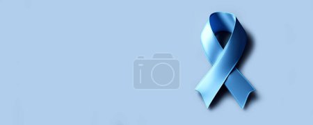 Téléchargez les photos : Blue cancer awareness ribbon banner or header background with copy space - en image libre de droit