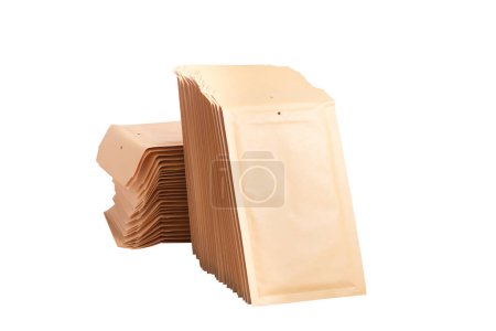 Photo for Lot of brown bubble envelopes on the office desk - Royalty Free Image