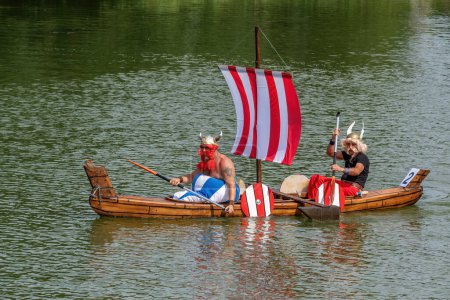 Photo for Breclav Czech Republic, 22.07.2023, Races of funny amateur vessels, neckyada. Asterix and Obelix arrive at their destination - Royalty Free Image