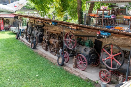 Photo for Znojmo, Czech Republic August 28, 2023 Museum of Motoring, Exposition of historical grain threshing machines - Royalty Free Image