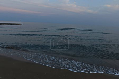 Photo for View of Lido di Jesolo beach in the early evening at sunset, Italy - Royalty Free Image