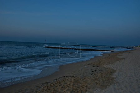 Photo for View of Lido di Jesolo beach early in the morning at different phases of sunrise, Italy - Royalty Free Image