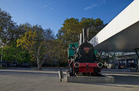 Photo for Sofia, Bulgaria -  November 07, 2023: View of a pleasant corner of the Central Railway Station with an old steam locomotive on display, Sofia, Bulgaria. Visit in place. - Royalty Free Image
