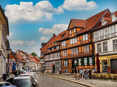Photo for Quedlinburg,Saxony-Anhalt, Germany. 06 July 2021. small town with old vintage small colored houses and old cobblestone pavement. UNESCO World Heritage city. Europe travel concept - Royalty Free Image