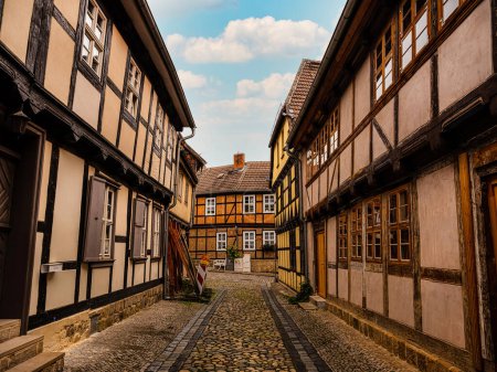 Photo for Quedlinburg,Saxony-Anhalt, Germany. 06 July 2021. small town with old vintage small colored houses and cobblestone pavement. UNESCO World Heritage city. Europe travel concept - Royalty Free Image