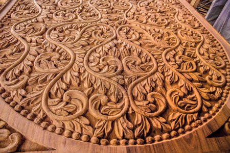 Photo for Stone Town, Zanzibar, Tanzania. 27 March 2018. a magnificent pattern carved from wood in a Tanzanian workshop. Close-up - Royalty Free Image