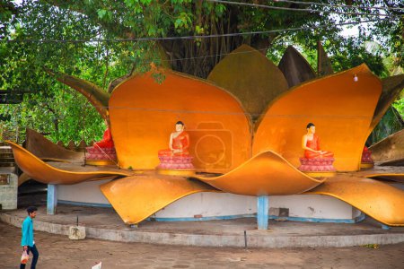 Photo for Aluthgama, Sri Lanka 07. 02. 2023 Statue in Kande Viharaya Temple in Aluthgama near Popular Tourist Center Bentota and Beruwala. Statue Buddha in lotus - Royalty Free Image