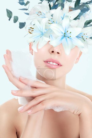 Photo for Young woman with abstract flowers mask have skin care treatment - Royalty Free Image