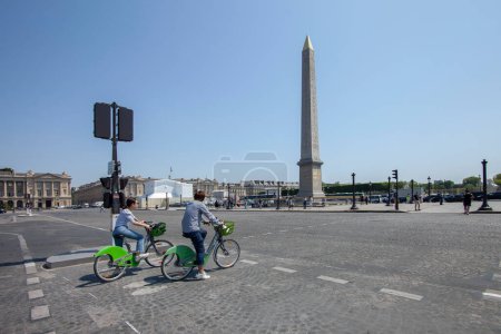 Photo for PARIS, FRANCE - JUNE 08, 2023: Tourists on bikes at Place de la Concorde in Paris - Royalty Free Image