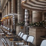 PARIS, FRANCE - December 01, 2023: Fashionable brasserie with terrace serving breakfast, French baguette sandwiches, snacks and drinks - Le Nemours