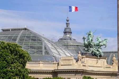 Photo for PARIS, FRANCE - April 16, 2024: The Grand Palais is a majestic architectural structure in the Beaux-Arts style, located on the right bank of the Seine southwest of the Champs-Elyses in the 8th arrondissement of Paris. - Royalty Free Image