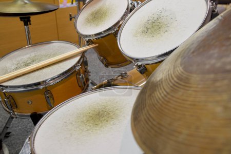drums and a cymbal of a drum kit