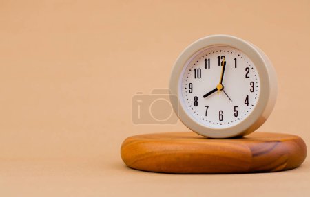Photo for Alarm clock on plank, modern timepiece, precious time concept. Time planner. Working with limited time. - Royalty Free Image