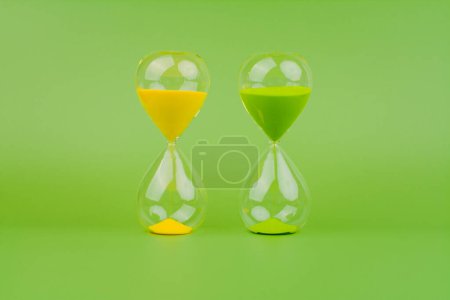 Photo for Hourglass, colorful countdown, time limit, time concept and importance of spending time. - Royalty Free Image