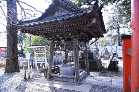 Photo for The purification fountain 'Chozuya' in the Japanese shrine. It's place where you wash your hands and rinseyour mouth at a shrine. This is a ritual cleansing. - Royalty Free Image
