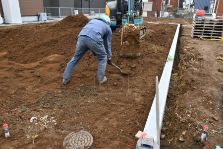 Téléchargez les photos : A view of a foundation construction site for a residential building. - en image libre de droit