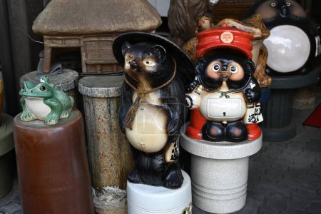 Photo for Japan tourism. Famous pottery. Famous pottery Shigaraki Ware. It is famous for its raccoon dog ( Tanuki ) ornaments. Koka city, Shiga prefecture, Japan. - Royalty Free Image