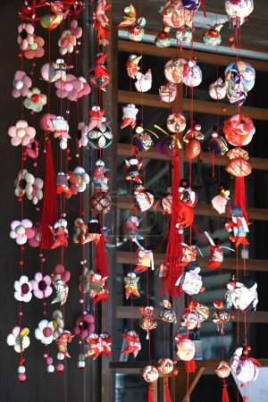 Hina-ninngyo is a special doll wearing a traditional japanese costume for doll's festival.And Hina-festival(Doll's festival) is an occasion to pray for young girl's growth and happiness.