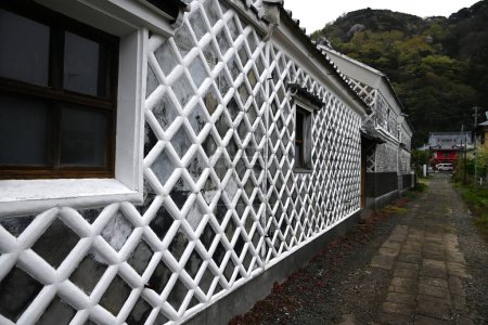 Japan Travel. Traditional Japanese wall pattern, called Namako Wall in Japan. A wall covered square tiles jointed with raised plaster. Matsuzaki Town, Shizuoka Prefecture, Japan.