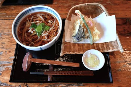 A view inside a Japanese soba restaurant that utilizes an old folk house. The old Japanese furniture was in perfect harmony with the Japanese cuisine.