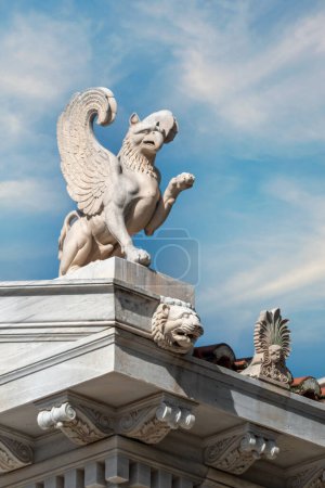 Photo for The pediment of the neoclassical building Zappeion Hall. The left cape of the pediment in the form of a griffin. The gutter has the shape of a lion's head. - Royalty Free Image