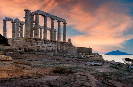 Photo for Sounion, Attica - Greece: Colorful sunset at Cape Sounion with the Temple of Poseidon. One of the Twelve Olympian Gods in ancient Greek religion and myth. God of the sea, earthquakes. Nobody - Royalty Free Image