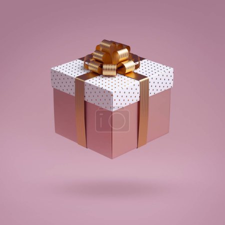 3d wrapped gift box with golden ribbon bow. Romantic festive clip art, isolated on pink background. Feminine icon. Single object. Abstract commercial concept.