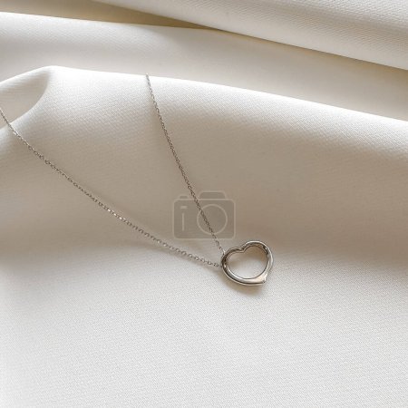 Photo for A beautifully made sterling silver heart shaped pendant necklace to show I Love You. - Royalty Free Image
