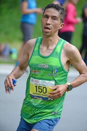 Photo for Zinal, SWITZERLAND - AUGUST 7: Elite runner, William RODRIGUEZ (COL) in the Sierre-Zinal World ChampionshipTrail Race:  August 7, 2021 in Zinal, Switzerland - Royalty Free Image