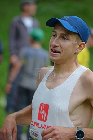 Photo for Zinal, SWITZERLAND - AUGUST 7: Elite runner, Clovis CHAVEROT (FRA)  in the Sierre-Zinal World ChampionshipTrail Race:  August 7, 2021 in Zinal, Switzerland - Royalty Free Image