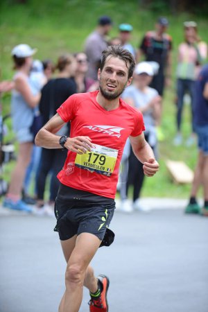 Photo for Zinal, SWITZERLAND - AUGUST 7: Elite runner, Kevin VERMEULEN (FRA) in the Sierre-Zinal World ChampionshipTrail Race:  August 7, 2021 in Zinal, Switzerland - Royalty Free Image