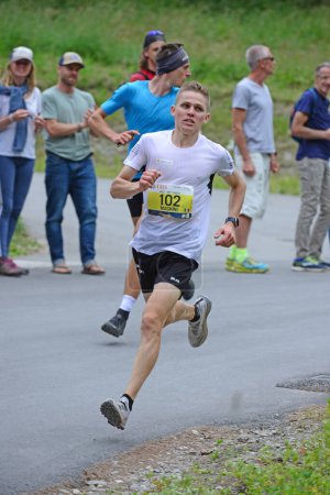 Photo for Zinal, SWITZERLAND - AUGUST 7: Davide MAGNINI (ITA) fifth in the Sierre-Zinal World ChampionshipTrail Race:  August 7, 2021 in Zinal, Switzerland - Royalty Free Image
