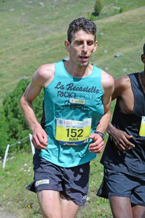 Photo for Zinal, SWITZERLAND - AUGUST 7: Elite runner, Fabio RUGA (ITA) in the Sierre-Zinal World ChampionshipTrail Race:  August 7, 2021 in Zinal, Switzerland - Royalty Free Image