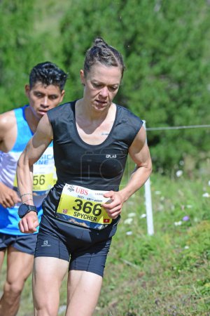 Photo for Zinal, SWITZERLAND - AUGUST 7: Elite runner, Odile SPYCHER (SUI) in the Sierre-Zinal World ChampionshipTrail Race:  August 7, 2021 in Zinal, Switzerland - Royalty Free Image