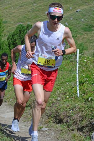 Photo for Zinal, SWITZERLAND - AUGUST 7: Bonnet ahead of World Champion   Jornet in the Sierre-Zinal World ChampionshipTrail Race:  August 7, 2021 in Zinal, Switzerland - Royalty Free Image