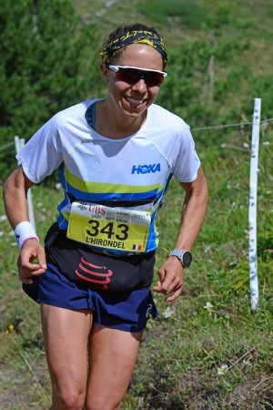 Photo for Zinal, SWITZERLAND - AUGUST 7: World Champion, Blandine L'Hirondelle (F)  in the Sierre-Zinal World ChampionshipTrail Race:  August 7, 2021 in Zinal, Switzerland - Royalty Free Image