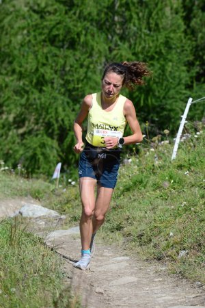 Photo for Zinal, SWITZERLAND - AUGUST 7: Elite runner, Anais Sabrie (F) in the Sierre-Zinal World ChampionshipTrail Race:  August 7, 2021 in Zinal, Switzerland - Royalty Free Image