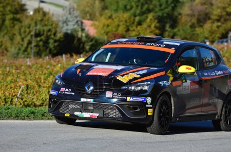 Photo for CHALAIS, SWITZERLAND - OCTOBER 15: Filip and Lazar in their Renault Clio driving the in the International Rally du Valais:  October 15, 2022 in Chalais, Switzerland - Royalty Free Image