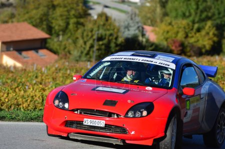 Photo for CHALAIS, SWITZERLAND - OCTOBER 15: Nanchen and Monnet in their Ford Puma driving the in the International Rally du Valais:  October 15, 2022 in Chalais, Switzerland - Royalty Free Image
