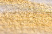 Abstract background in gold on watercolor paper. Poster #619809926