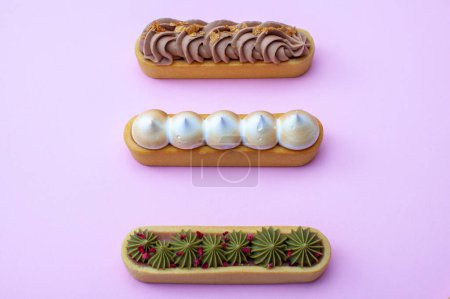 Photo for Lemon, pistachio and hazelnut tart on pink background - Royalty Free Image